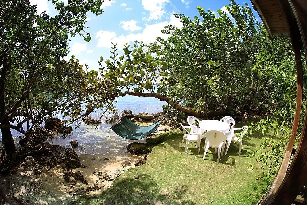 Semesterbostad Cottages On Half Moon Beach Green Island